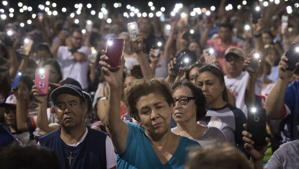 مواطنون في إل باسو يصلون من أجل ضحايا هجمات إطلاق النار مواطنون في إل باسو يصلون من أجل ضحايا هجمات إطلاق النار - سبوتنيك عربي
