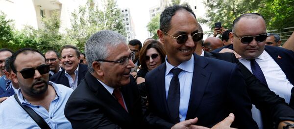 وزير الدفاع التونسي، عبد الكريم الزبيدي، يقدم أوراقه لرئاسة الجمهورية، 7 أغسطس/آب 2019 - سبوتنيك عربي