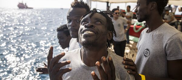 المهاجرون على سفينة أوبن آرمز - سبوتنيك عربي