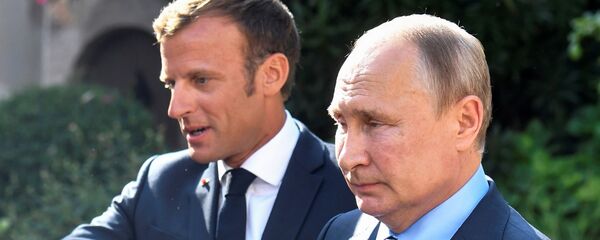 الرئيس الروسي فلاديمير بوتين والرئيس الفرنسي إيمانويل ماكرون  - سبوتنيك عربي