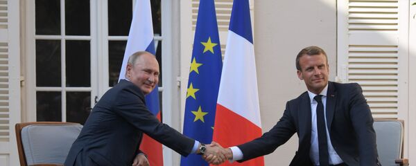 الرئيس الروسي فلاديمير بوتين ونظيره الفرنسي إيمانويل ماكرون - سبوتنيك عربي