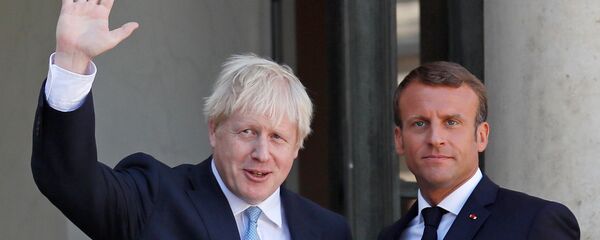 بوريس جونسون وإيمانويل ماكرون - سبوتنيك عربي