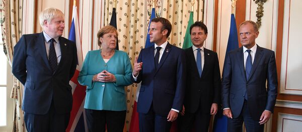 رئيس وزراء بريطانيا بوريس جونسون والرئيس الفرنسي إيمانويل ماكرون والمستشارة الألمانية أنجيلا ميركل ورئيس الوزراء الإيطالي بالإنابة جوزيبي كونتي ورئيس المجلس الأوروبي دونالد توسكا يحضرون قمة مجموعة السبع - سبوتنيك عربي