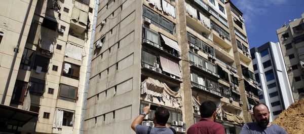 المبنى المستهدف في الضاحية الجنوبية لبيروت المبنى المستهدف في الضاحية الجنوبية لبيروت - سبوتنيك عربي