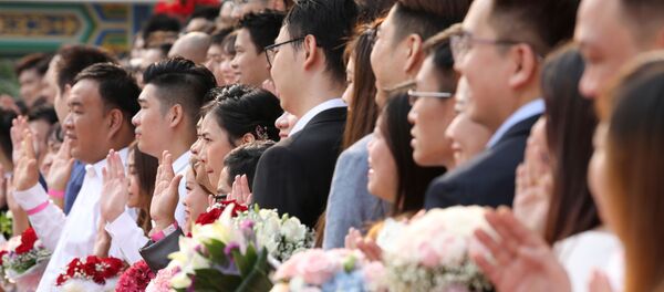 المشاركون في عرس جماعي في كوالا لمبور، ماليزيا 9 سبتمبر/ أيلول 2019 المشاركون في عرس جماعي في كوالا لمبور، ماليزيا 9 سبتمبر/ أيلول 2019 - سبوتنيك عربي