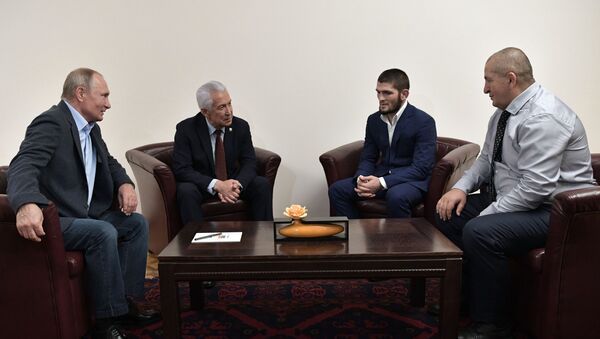 حبيب نورمحمدوف يلتقي مع الرئيس الروسي فلاديمير بوتين  - سبوتنيك عربي