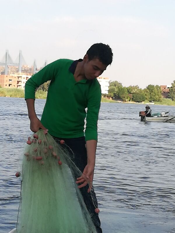 بالصور والفيديو... يوميات صياد في نيل مصر  - سبوتنيك عربي