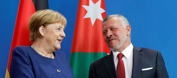 ميركل خلال مؤتمر صحفي مع العاهل الأردني الملك عبد الله  - سبوتنيك عربي