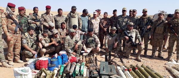 القوات العراقية تدمر مخازن أسلحة لـداعش في الحدود  - سبوتنيك عربي