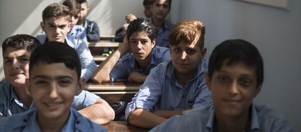 تلاميذ مدرسة الشهيد عدنان كولكي في حي برزة بدمشق، سوريا - سبوتنيك عربي