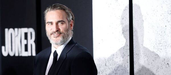 الممثل واكين فينيكس في العرض الخاص للفيلم الأمريكي الجوكر في لوس أنجلوس، 29 سبتمبر/أيلول 2019 - سبوتنيك عربي