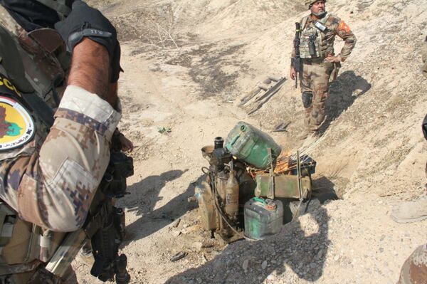 القوات العراقية تدمر 9 أوكار لـداعش في سلسلة جبلية... صور - سبوتنيك عربي