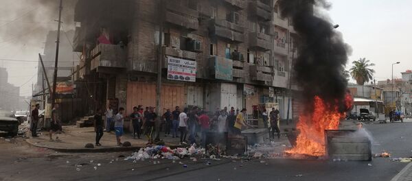 بغداد تشتعل، تظارهات، مظاهرات، احتجاجت بغداد، العراق 2 أكتوبر 2019 - سبوتنيك عربي