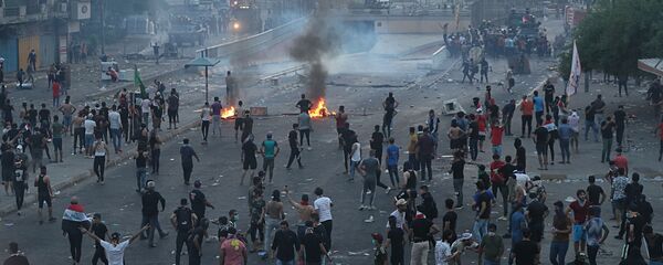 بغداد تشتعل، تظارهات، مظاهرات، بغداد، العراق 2 أكتوبر 2019 - سبوتنيك عربي