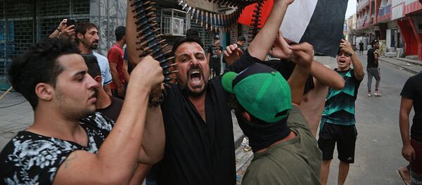 بغداد تشتعل، تظارهات، مظاهرات، احتجاجت بغداد، العراق 2 أكتوبر 2019 - سبوتنيك عربي