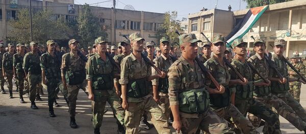 الجيش السوري يقيم عرضا عسكريا في الحسكة الجيش السوري يقيم عرضا عسكريا في الحسكة - سبوتنيك عربي