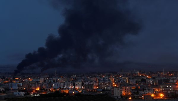 الدخان يتصاعد في مدينة رأس العين السورية الدخان يتصاعد في مدينة رأس العين السورية - سبوتنيك عربي