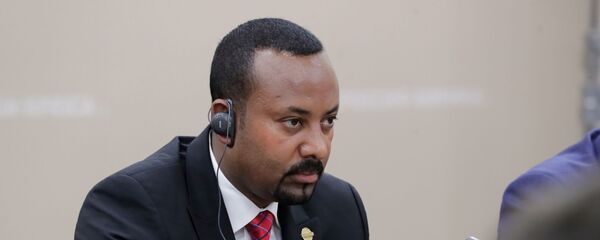  رئيس الوزراء الإثيوبي أبي أحمد علي خلال لقائه مع الرئيس الروسي فلاديمير بوتين على هامش القمة الروسية الأفريقية في سوتشي - سبوتنيك عربي