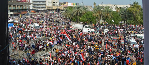 المتظاهرون في ساحة التحرير، بغداد - سبوتنيك عربي