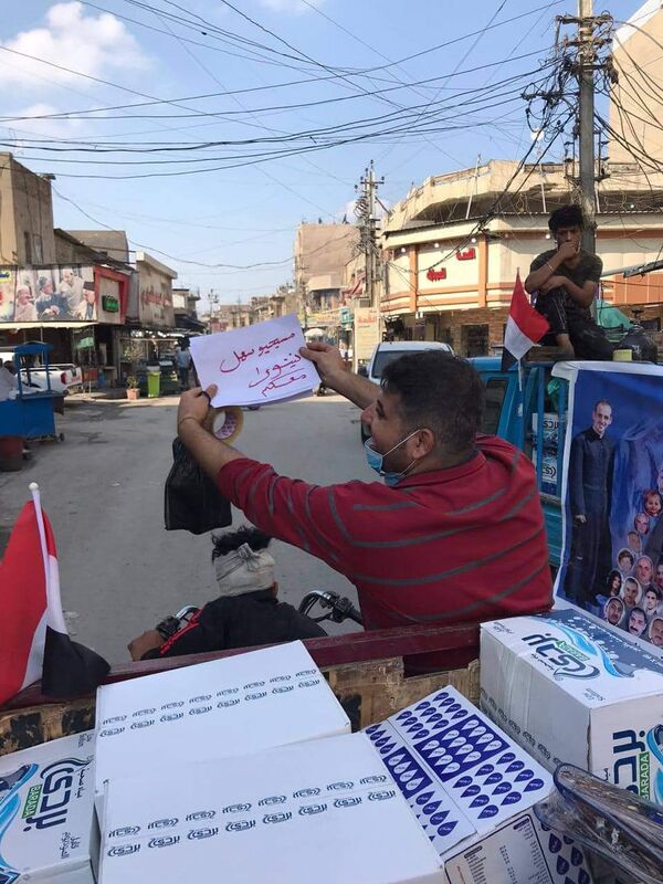 بالصور... قافلة دعم من أقدم سكان العراق للمتظاهرين - سبوتنيك عربي