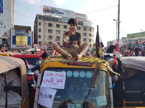 بالصور... قافلة دعم من أقدم سكان العراق للمتظاهرين - سبوتنيك عربي