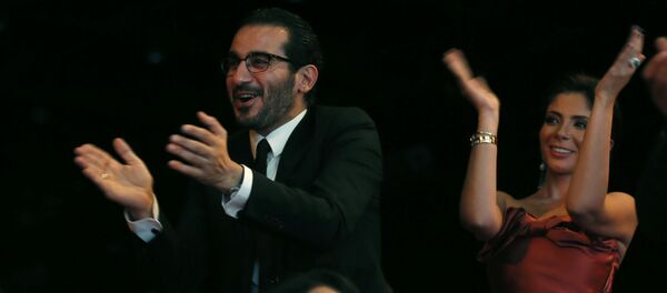 الفنانان المصريان منى زكي وأحمد حلمي - سبوتنيك عربي