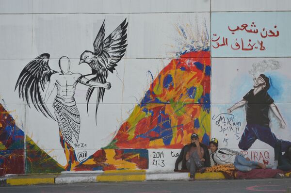 رسائل فنية من تظاهرات الشعب العراقي (صور) رسائل فنية من تظاهرات الشعب العراقي (صور) - سبوتنيك عربي