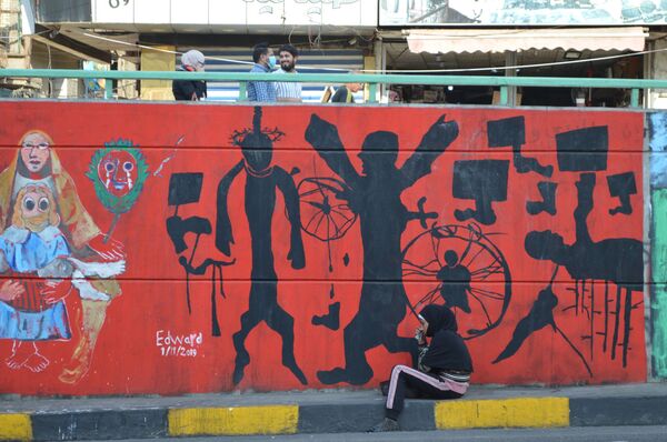 رسائل فنية من تظاهرات الشعب العراقي (صور) رسائل فنية من تظاهرات الشعب العراقي (صور) - سبوتنيك عربي