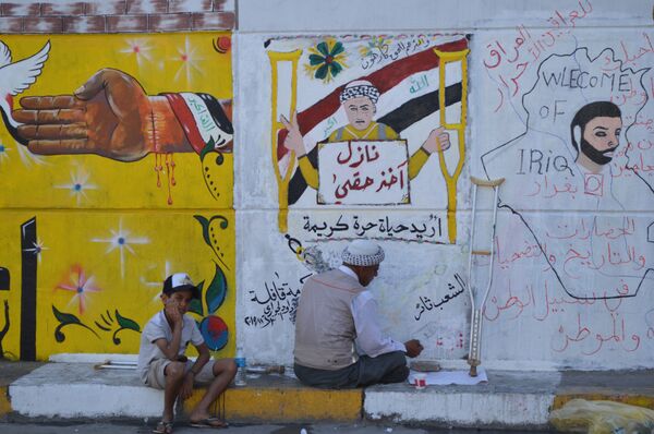 رسائل فنية من تظاهرات الشعب العراقي (صور) رسائل فنية من تظاهرات الشعب العراقي (صور) - سبوتنيك عربي