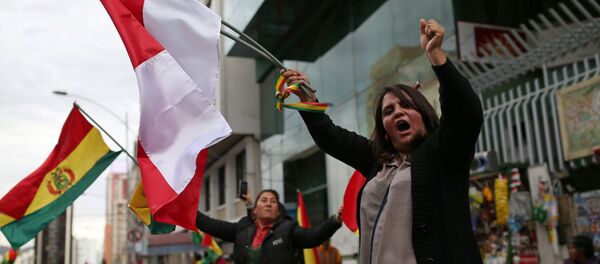 احتفالات في بوليفيا بعد أن أعلن الرئيس البوليفي إيفو موراليس استقالته  - سبوتنيك عربي