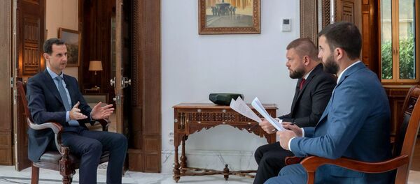 مقابلة السيد الرئيس بشار الأسد مع قناة روسيا 24– و وكالة سبوتينك - سبوتنيك عربي