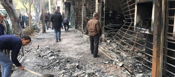 احتجاجات على رفع أسعار الوقود في  طهران، إيران 17 نوفمبر 2019 - سبوتنيك عربي