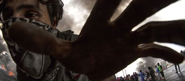 مشاركون في احتجاجات مدينة البصرة، العراق 25 نوفمبر 2019 - سبوتنيك عربي