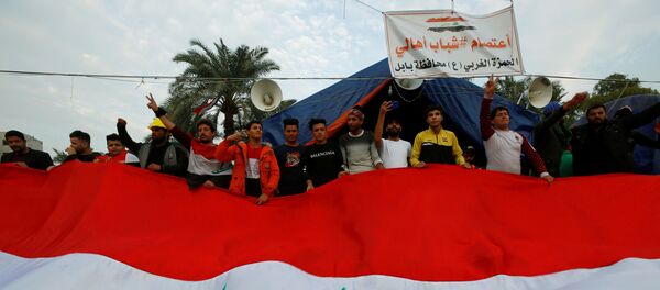 احتجاجات مناهضة للحكومة العراقية في بغداد، العراق 10 ديسمبر 2019 - سبوتنيك عربي