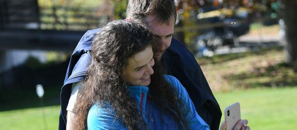 الرياضيان الروسيان (التزلج على الثلج) يلينا سوبوليفا وسيرغي أوستيوغوف  - سبوتنيك عربي