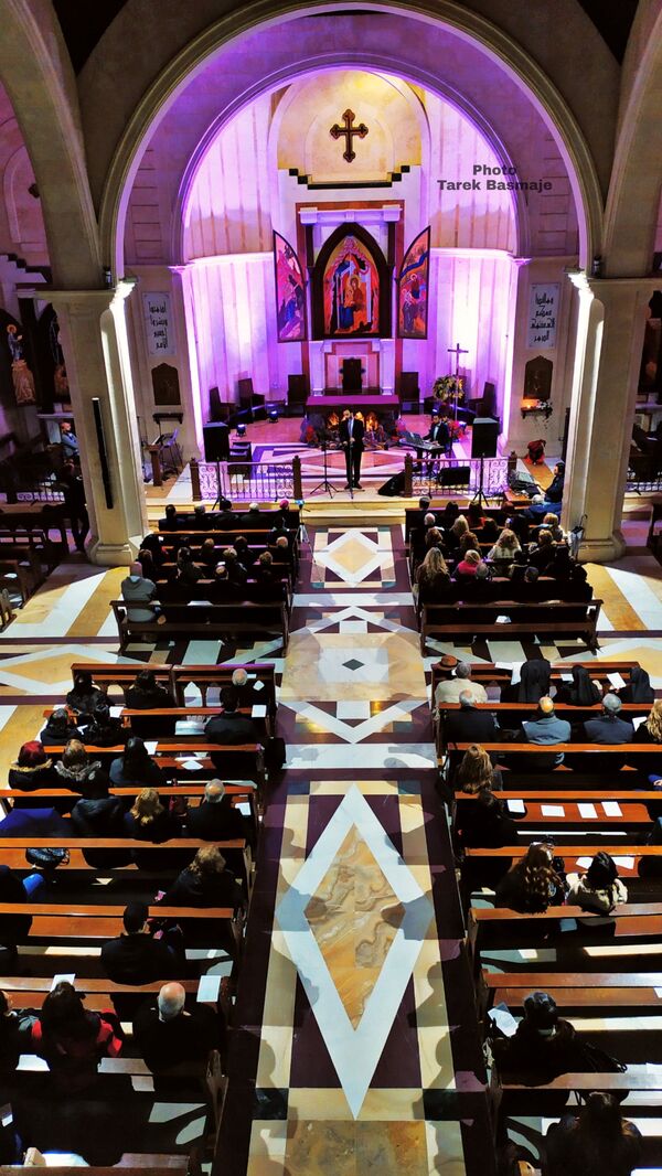 ترانيم في رأس السنة والميلاد تمتزج مع أصوات الآذان في حلب السورية - سبوتنيك عربي