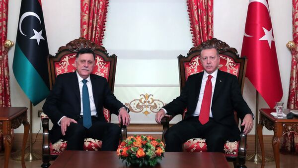 الرئيس التركي رجب طيب أردوغان ورئيس المجلس الرئاسي في ليبيا فايز السراج - سبوتنيك عربي
