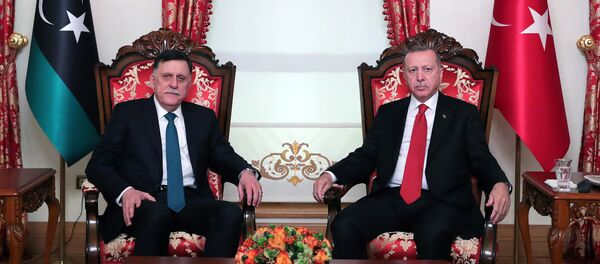 الرئيس التركي رجب طيب أردوغان ورئيس المجلس الرئاسي في ليبيا فايز السراج - سبوتنيك عربي