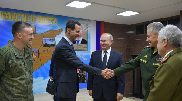 الرئيس الروسي  فلاديمير بوتين والرئيس السوري بشار الأسد أثناء اللقاء في مقر قيادة القوات المسلحة الروسية، سوريا 7 يناير 2020 - سبوتنيك عربي