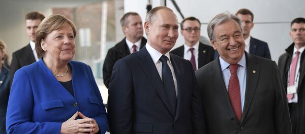 بوتين وميركل وغويترش في مؤتمر برلين حول ليبيا - سبوتنيك عربي