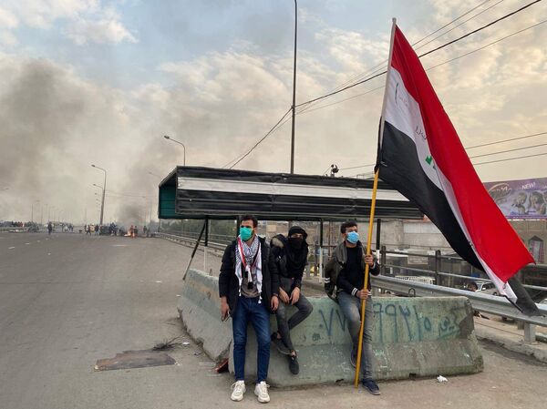  قتلى وجرحى بين المحتجين في سريع بغداد محمد القاسم إثر الرصاص... صور - سبوتنيك عربي