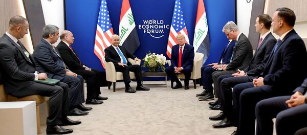 الرئيس الأمريكي دونالد ترامب يلتقي برئيس العراق برهم صالح خلال الاجتماع السنوي الخمسين للمنتدى الاقتصادي العالمي في دافوس - سبوتنيك عربي