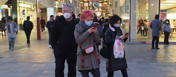 الصينيون يأخذون كافة الاحتياطات اللازمة فيما يخص انتشار فيروس كورونا الجديد، 21 يناير 2020 - سبوتنيك عربي