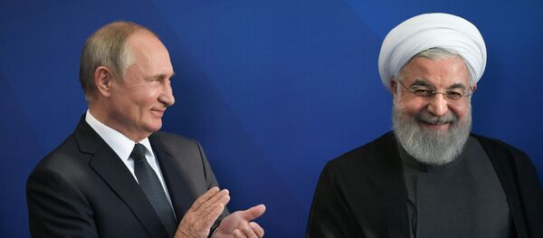 الرئيسان الروسي فلاديمير بوتين والإيراني حسن روحاني يحضران اجتماع المجلس الاقتصادي الأوروآسي الأعلى في يريفان في أرمينيا - سبوتنيك عربي