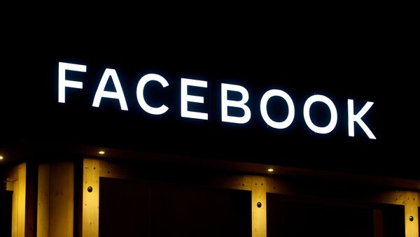 شعار شركة فيسبوك في منتدى دافوس الاقتصادي في سويسرا - سبوتنيك عربي
