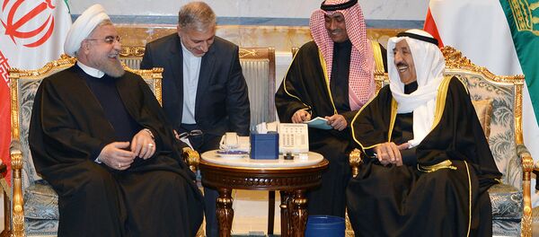 أمير الكویت الشيخ صباح الأحمد الجابر الصباح مع الرئيس الإيراني حسن روحاني - سبوتنيك عربي