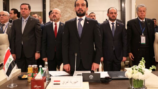 رئيس البرلمان العراقي محمد الحلبوسي يحضر جلسة طارئة للبرلمانيين العرب لمناقشة خطة سلام الرئيس الأمريكي دونالد ترامب في عمان بالأردن - سبوتنيك عربي