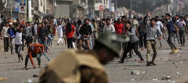 أعمال عنف في الهند احتجاجا على قانون الجنسية  - سبوتنيك عربي