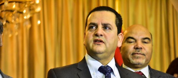 وزير خارجية الحكومة الليبية المؤقتة، عبد الهادي الحويج، في افتتاح السفارة الليبية في دمشق، سوريا - سبوتنيك عربي