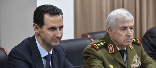 الرئيس السوري بشار الأسد يحضر اجتماعا مع الرئيس الروسي فلاديمير بوتين في دمشق بحضور وزير الدفاع السوري - سبوتنيك عربي